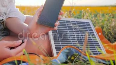 手机特写，电池充电器太阳能户外，可再生能源，特写屏幕蜂窝电话